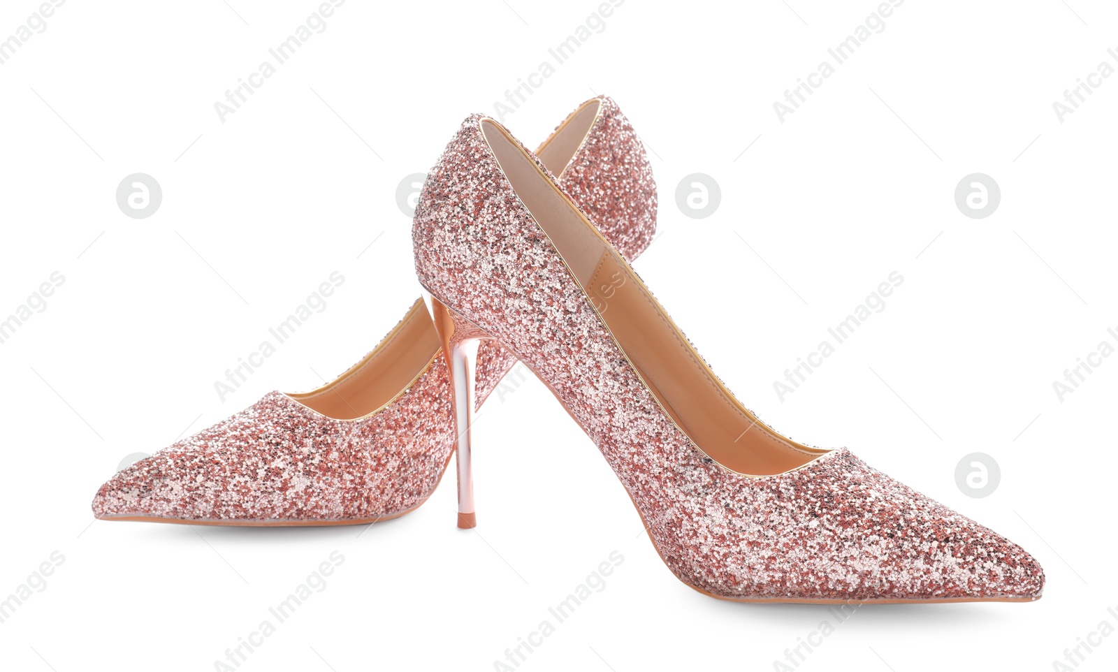 Beautiful high heeled shoes isolated on white Photo of Beautiful high heeled shoes isolated on white