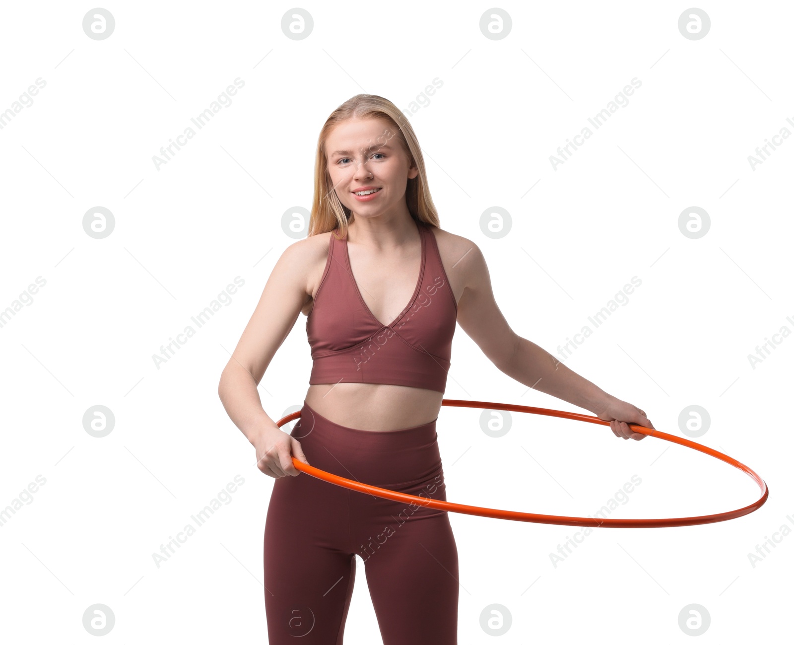 Photo of Beautiful young woman exercising with hula hoop on white background