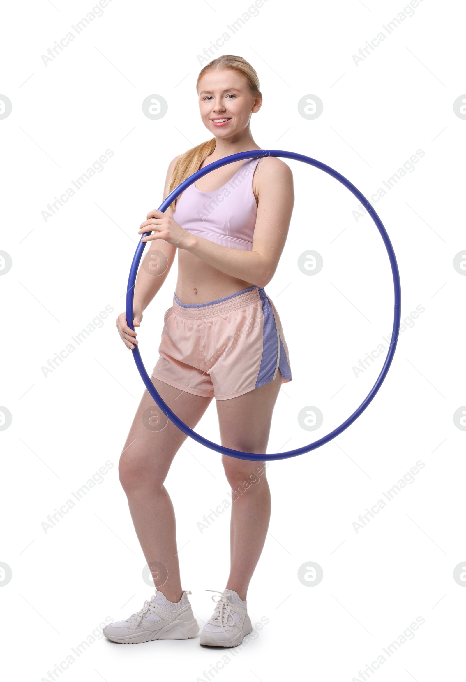 Photo of Beautiful young woman with hula hoop isolated on white