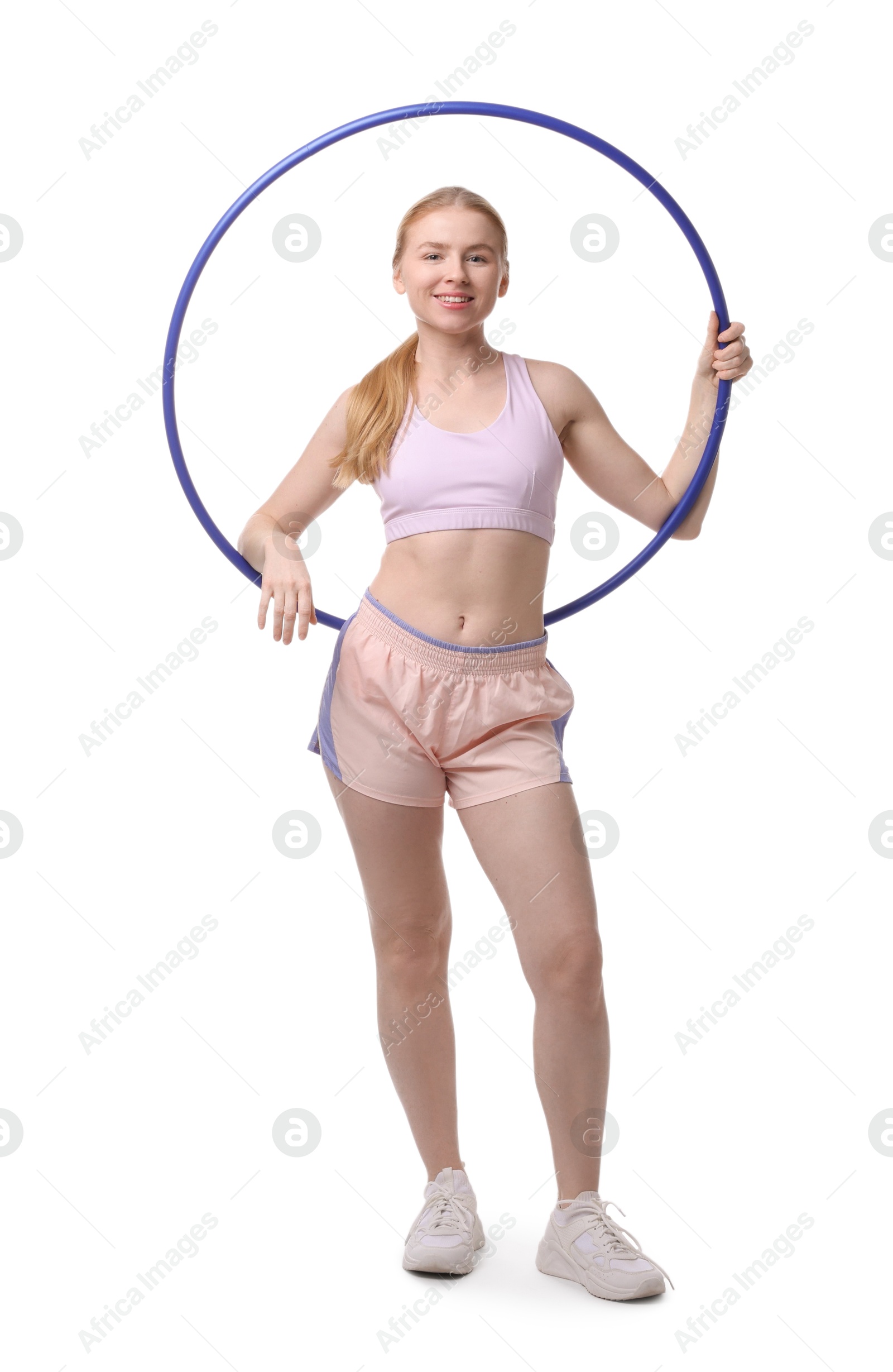 Photo of Beautiful young woman with hula hoop isolated on white