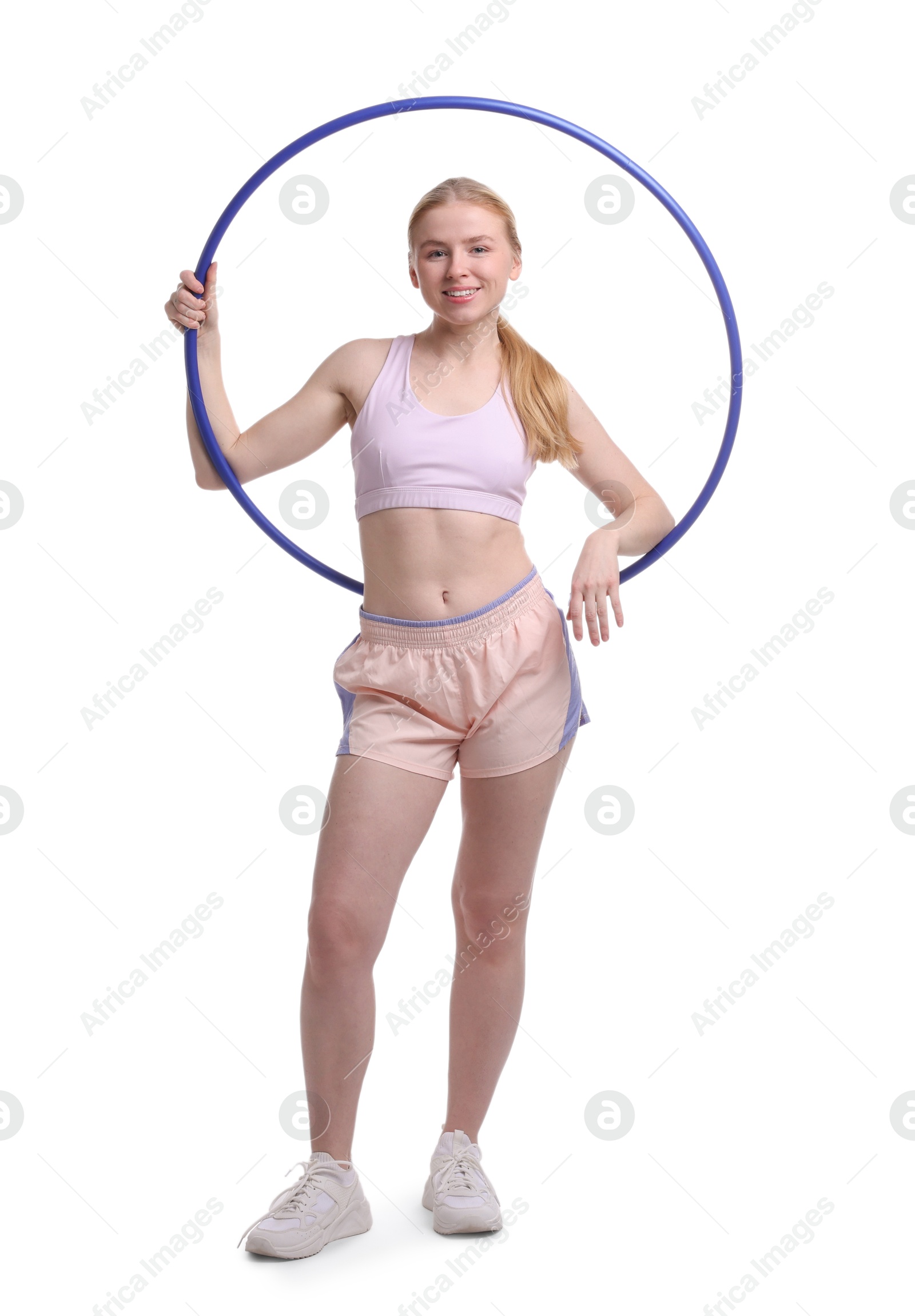 Photo of Beautiful young woman with hula hoop isolated on white