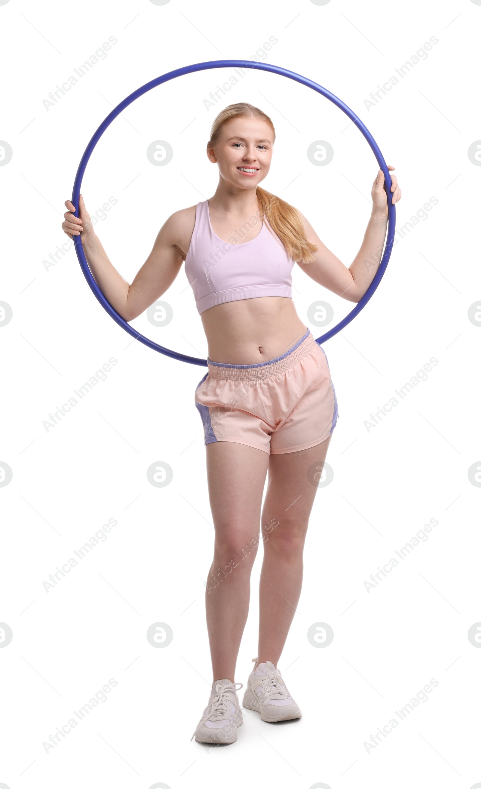 Photo of Beautiful young woman with hula hoop isolated on white