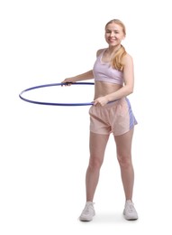 Photo of Beautiful young woman exercising with hula hoop on white background