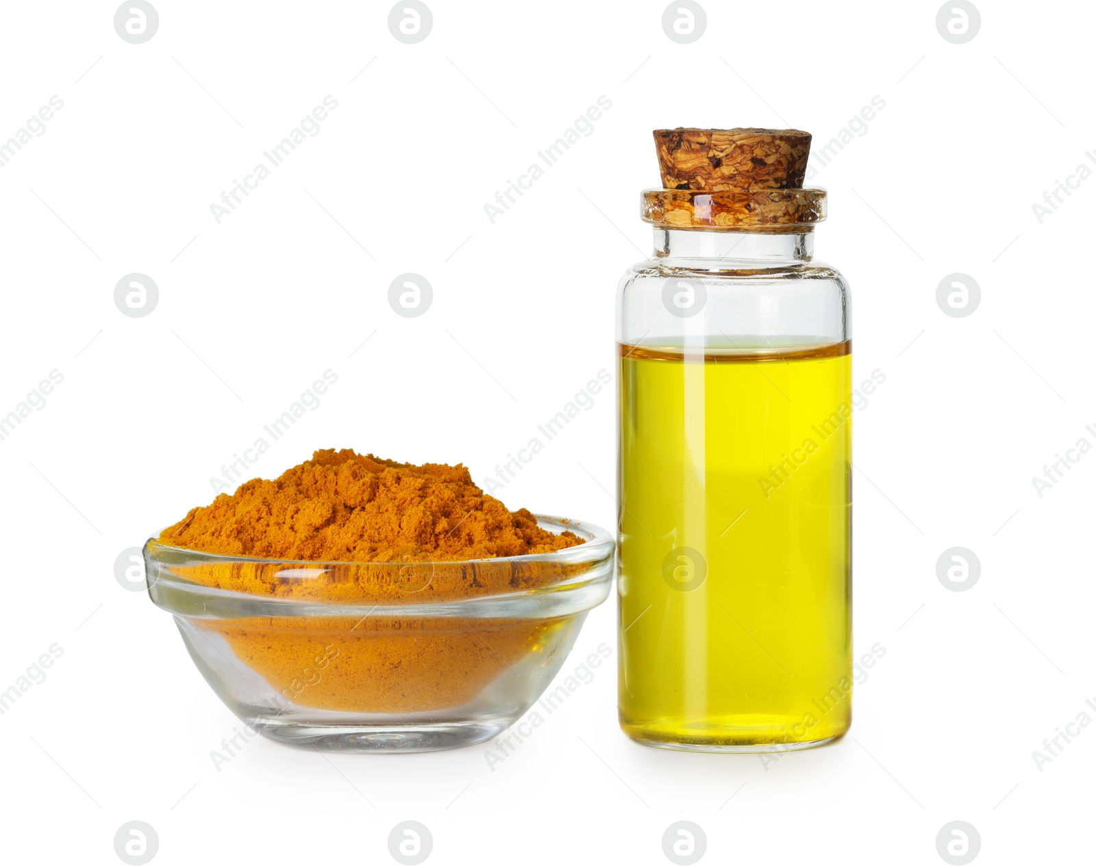 Photo of Bottle of turmeric essential oil and powder isolated on white