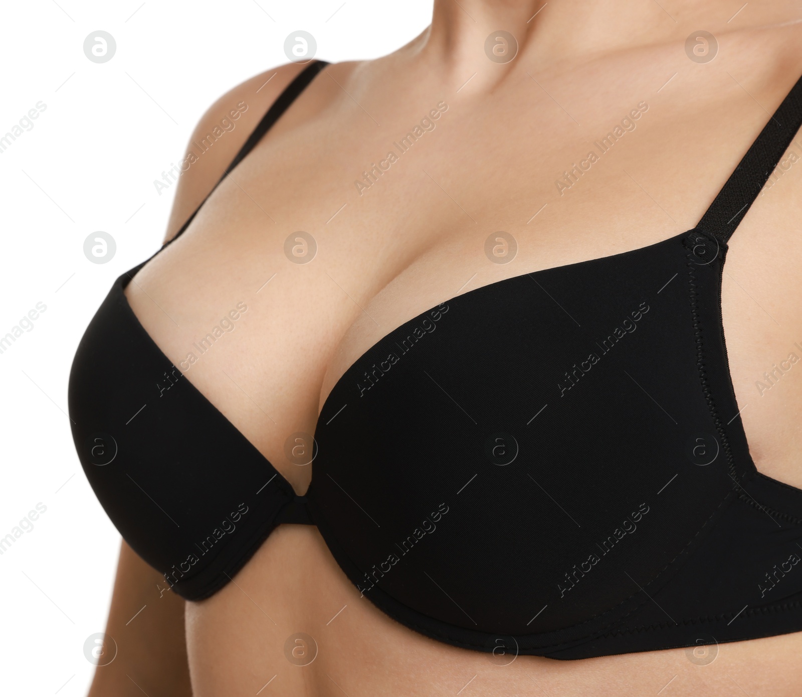 Photo of Woman wearing beautiful bra on white background, closeup