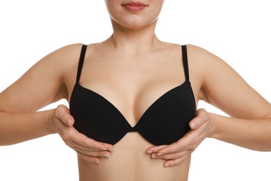 Photo of Woman wearing beautiful bra on white background, closeup