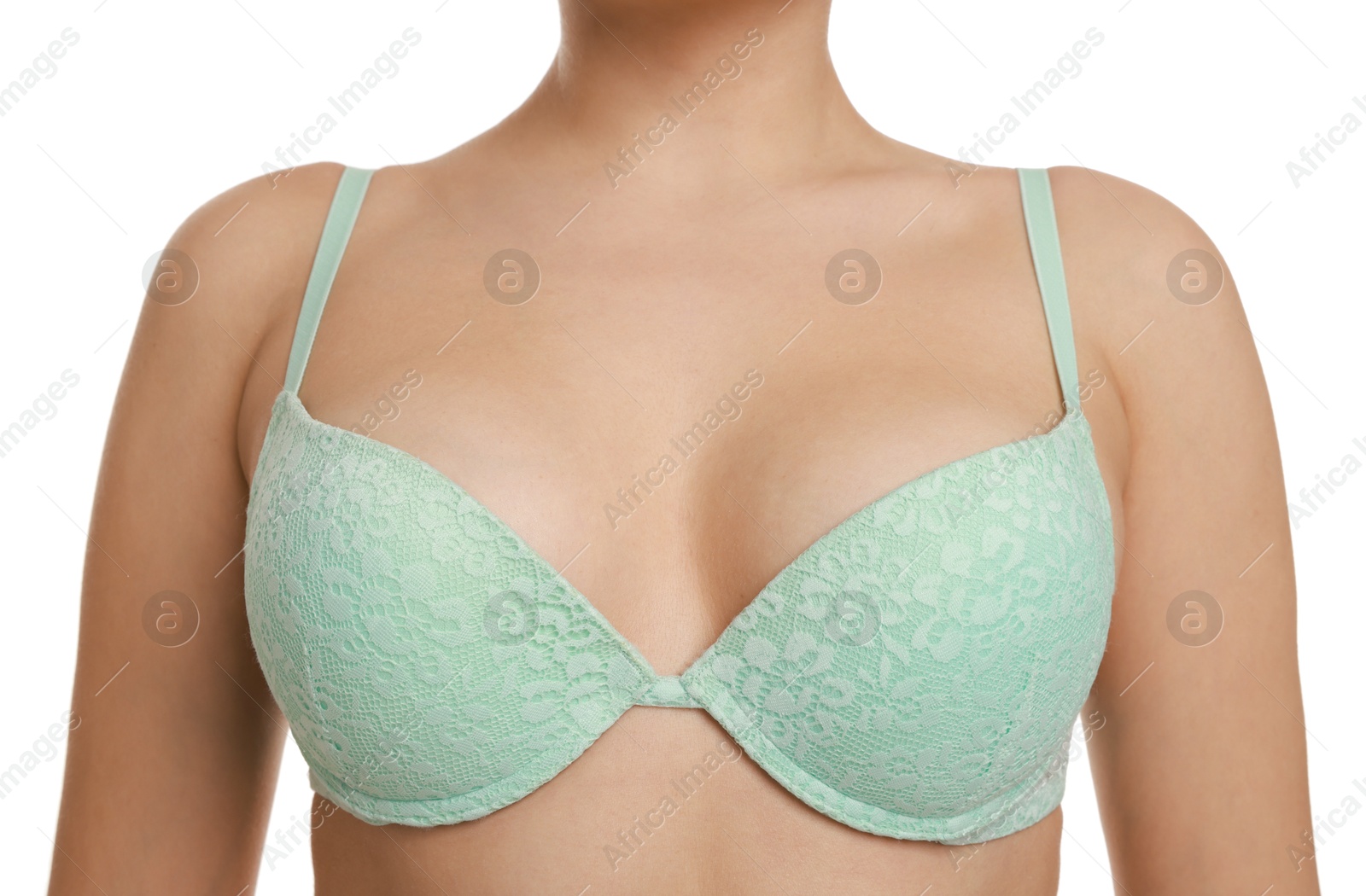 Photo of Woman wearing beautiful bra on white background, closeup