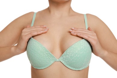 Photo of Woman wearing beautiful bra on white background, closeup