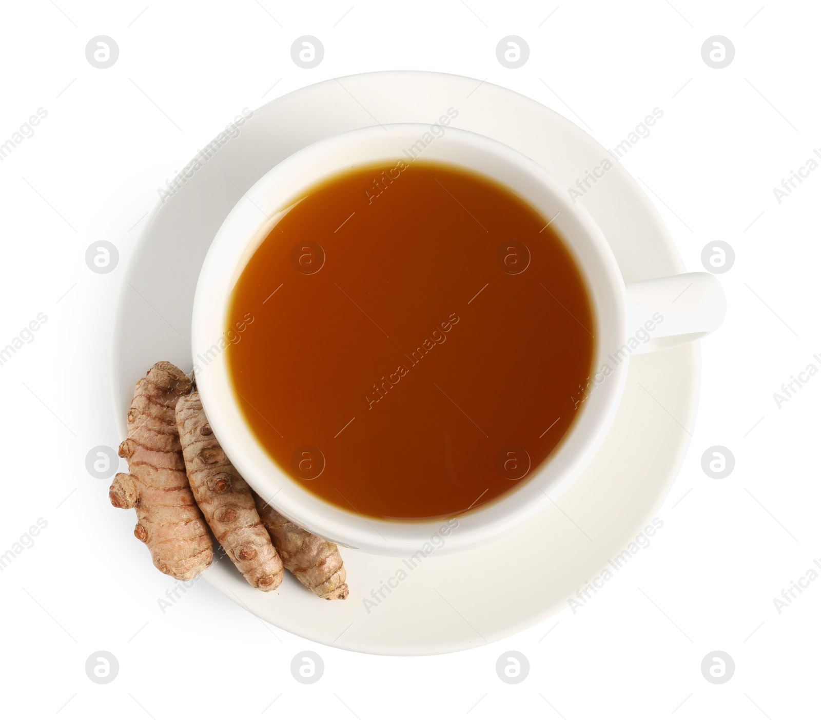 Photo of Aromatic turmeric tea in cup and roots isolated on white, top view