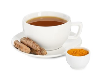 Photo of Aromatic turmeric tea in cup, roots and powder isolated on white