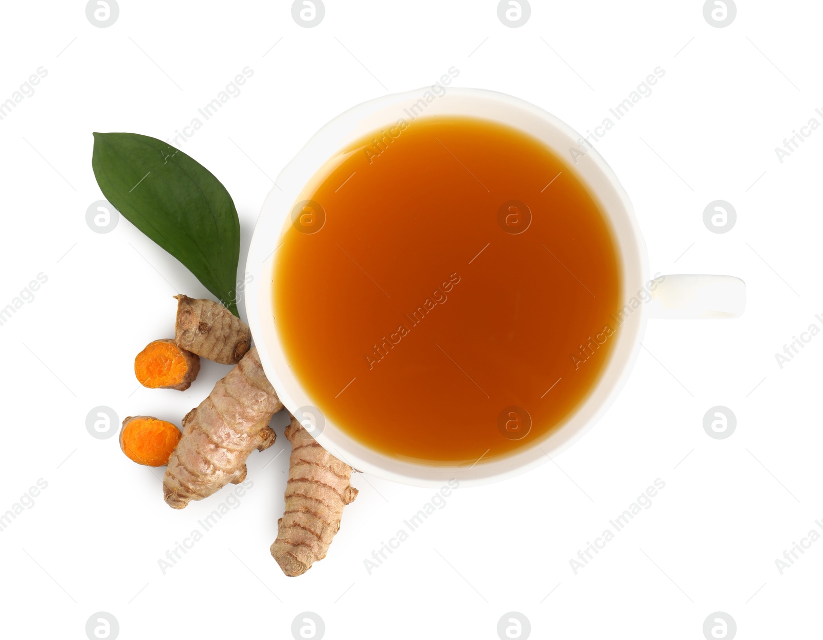 Aromatic turmeric tea in cup, roots and green leaf isolated on white, top view Photo of Aromatic turmeric tea in cup, roots and green leaf isolated on white, top view