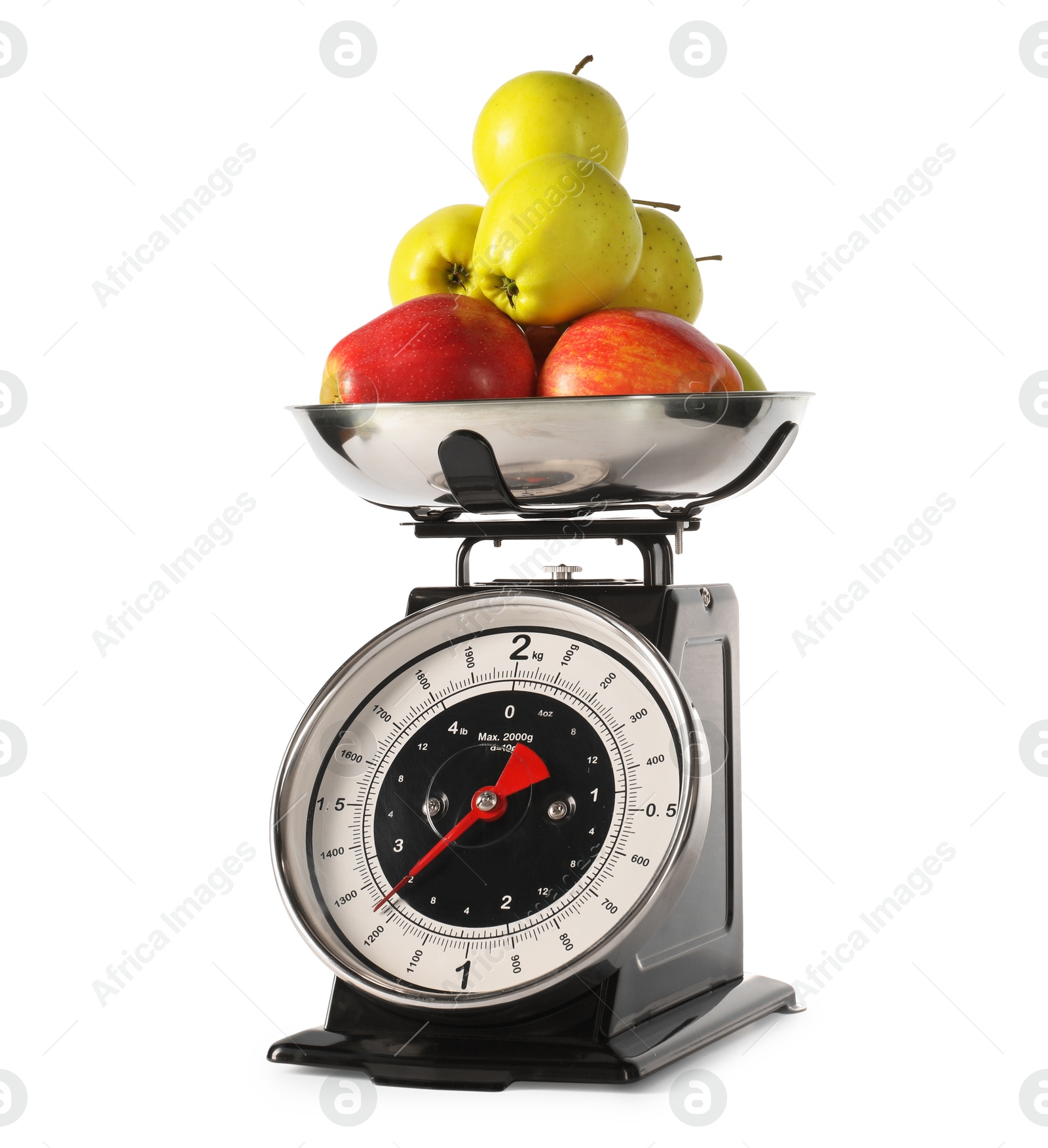 Photo of Retro mechanical kitchen scale with apples isolated on white