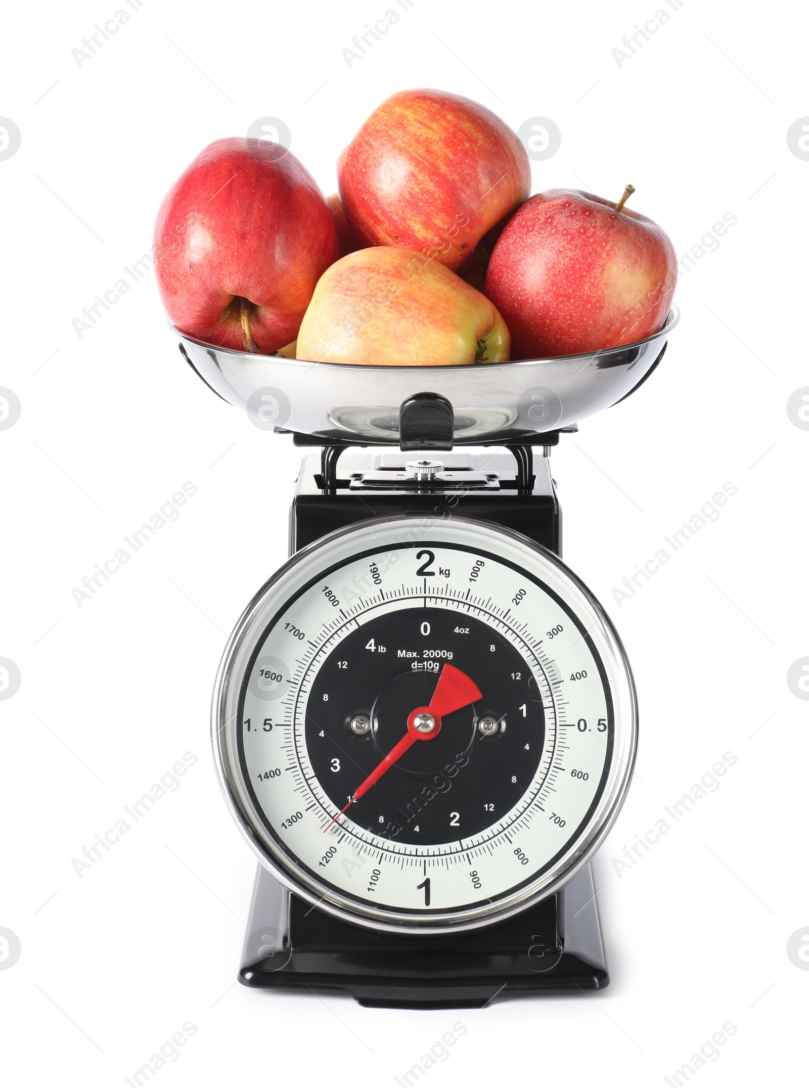 Photo of Retro mechanical kitchen scale with apples isolated on white