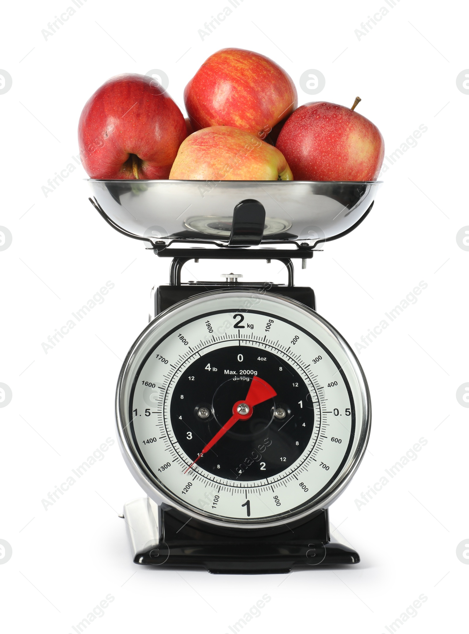 Photo of Retro mechanical kitchen scale with apples isolated on white