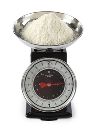 Photo of Retro mechanical kitchen scale with flour isolated on white