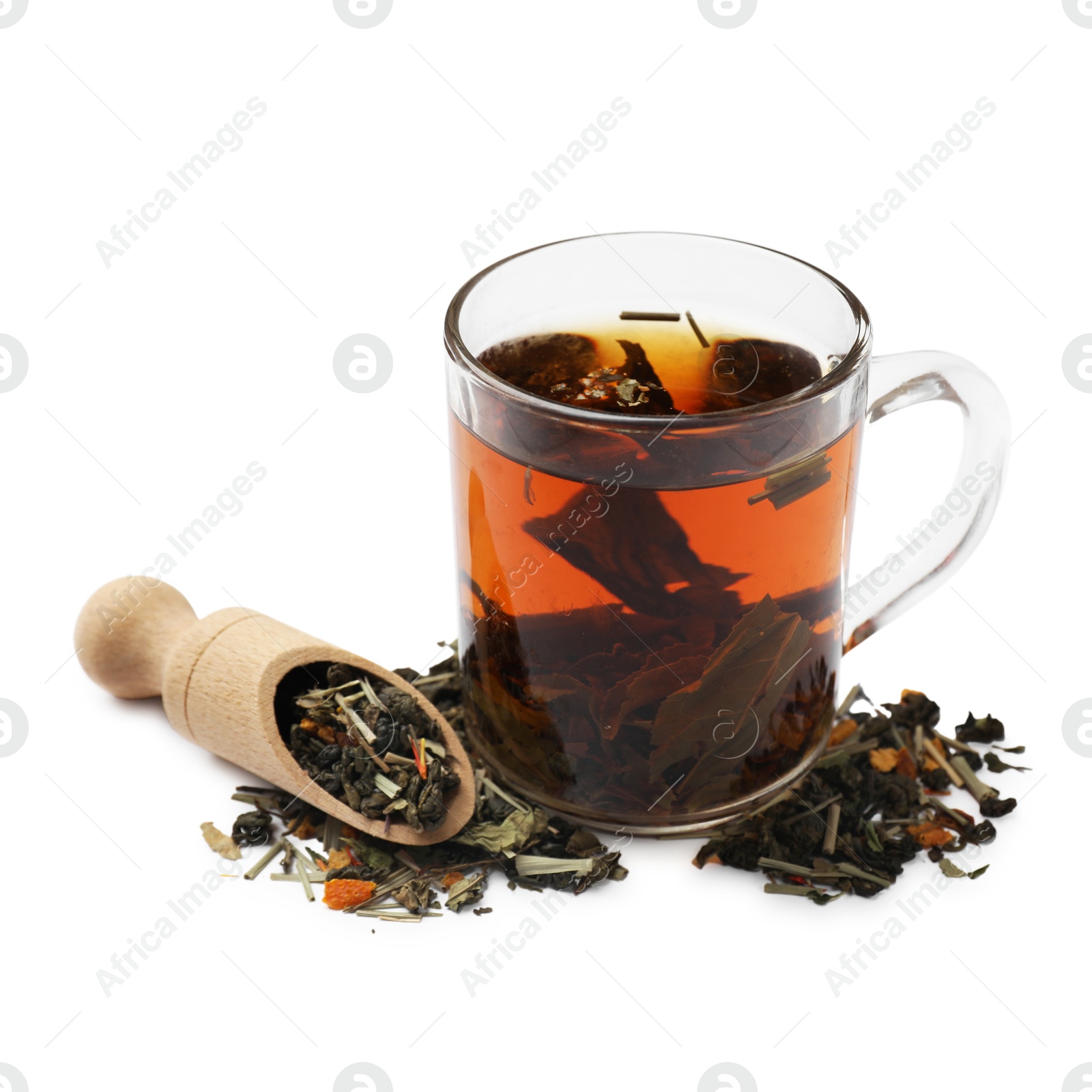 Photo of Aromatic tea and dried leaves isolated on white