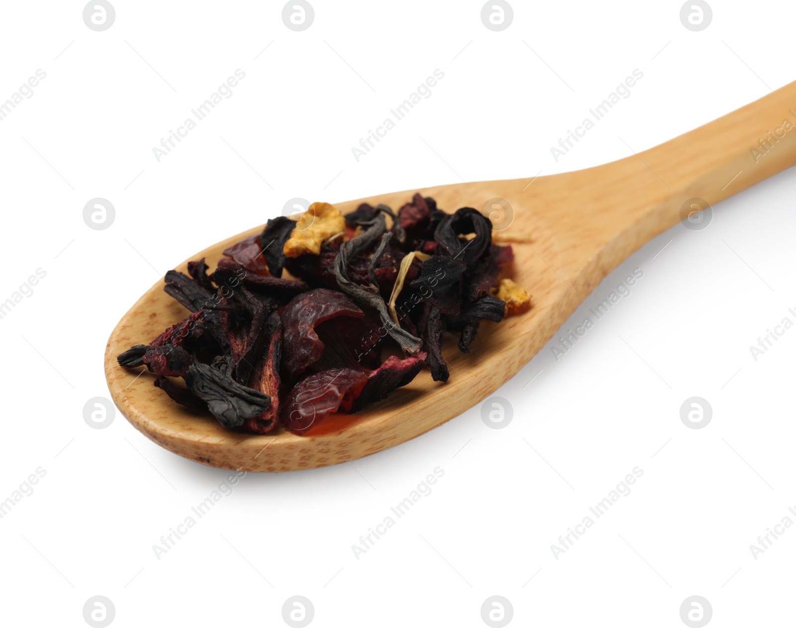 Photo of Spoon with dried tea leaves isolated on white