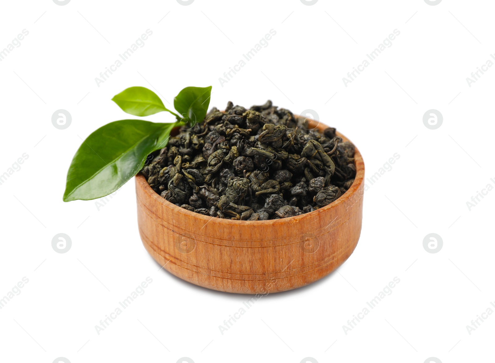 Photo of Dried and fresh tea leaves in bowl isolated on white