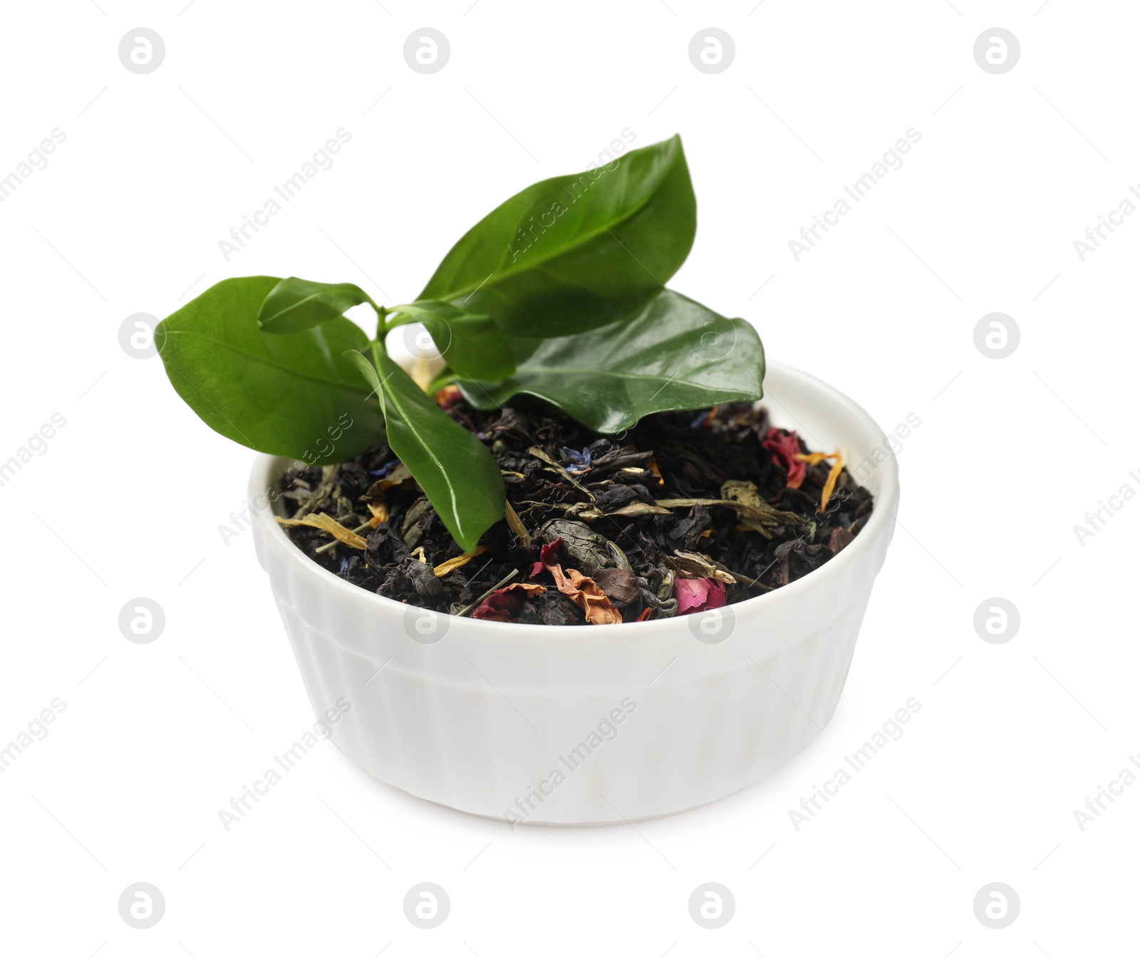 Photo of Dried and fresh tea leaves in bowl isolated on white