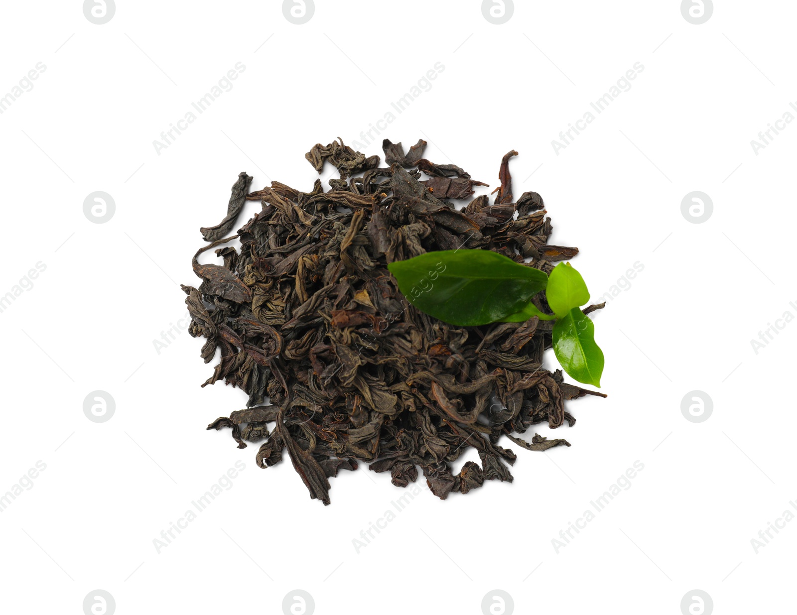 Photo of Pile of dried tea leaves isolated on white, top view