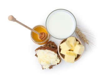 Tasty sandwich, butter, honey and milk isolated on white, top view