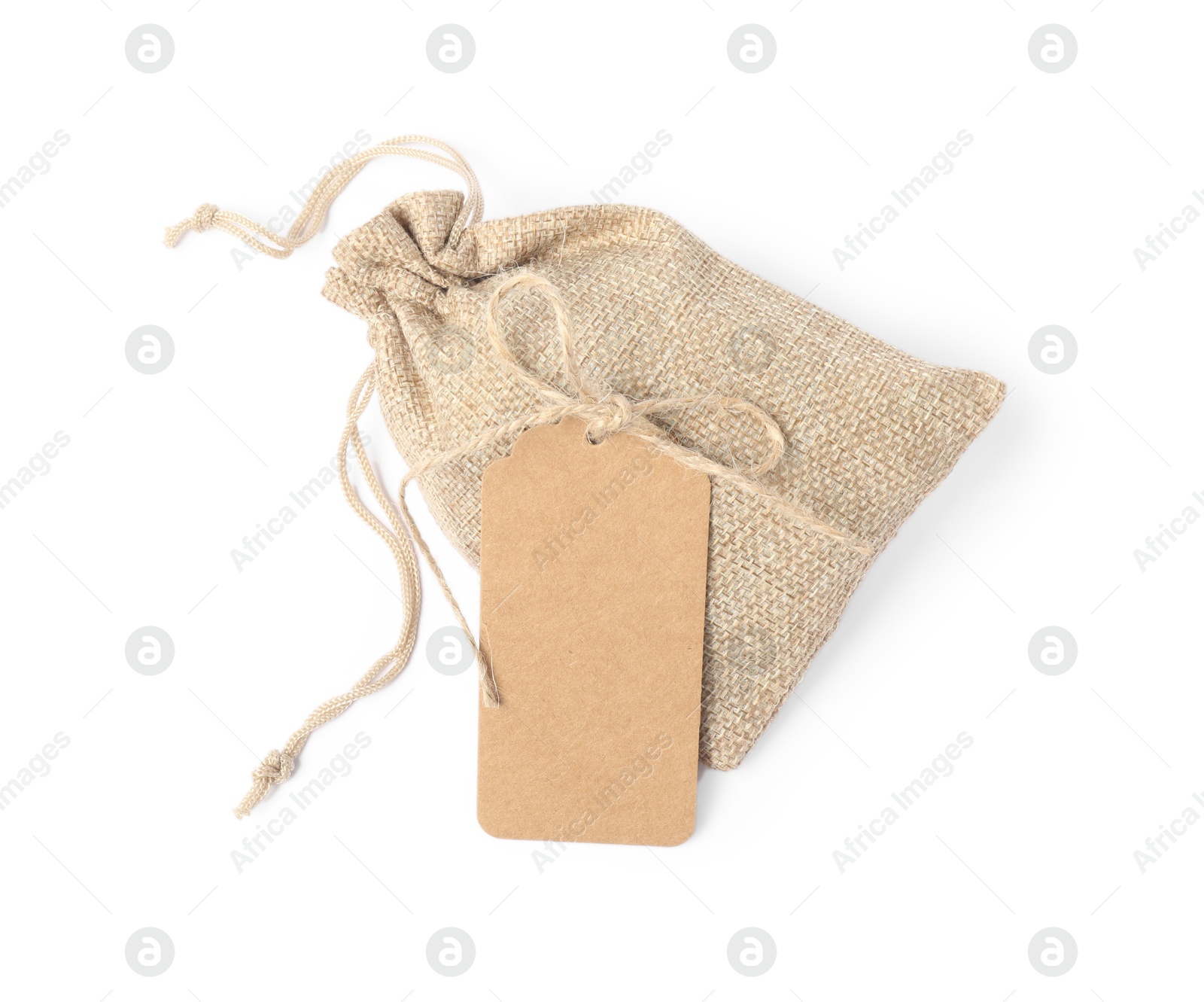 Photo of One burlap bag with tag isolated on white, top view