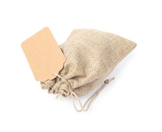 Photo of One burlap bag with tag isolated on white