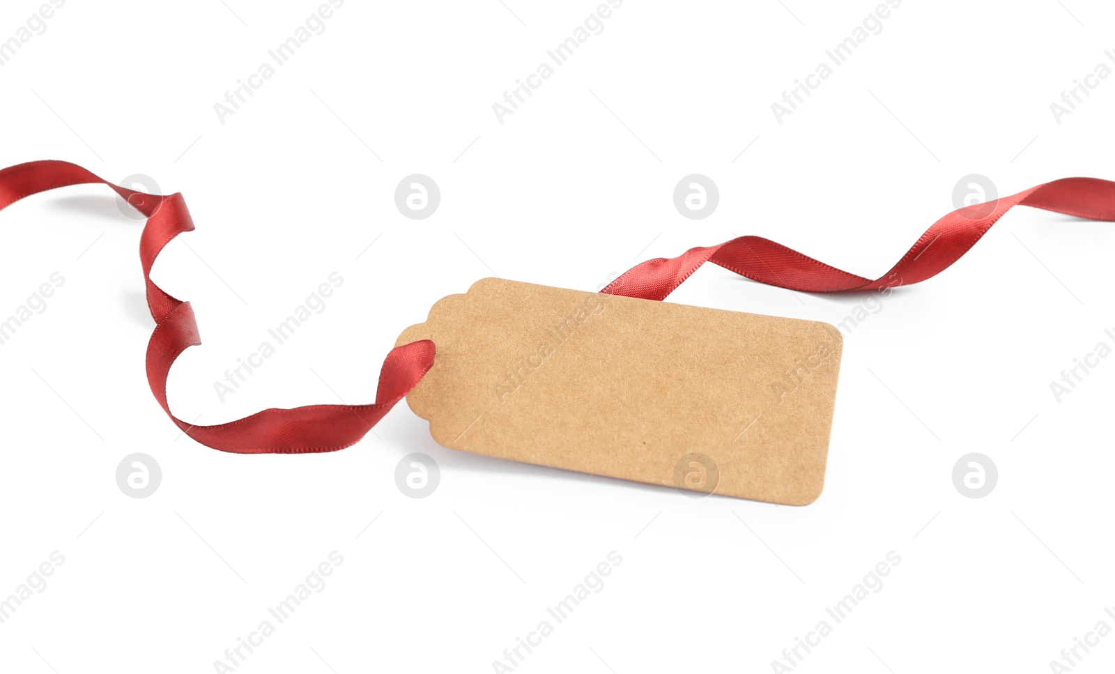 Blank tag with ribbon isolated on white Photo of Blank tag with ribbon isolated on white