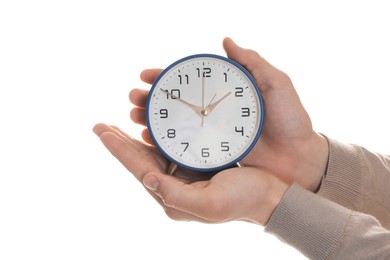 Photo of Man with alarm clock on white background, closeup