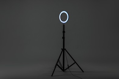 Photo of Ring lamp on stand against grey background