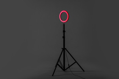 Photo of Ring lamp on stand against grey background