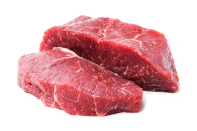 Photo of Pieces of raw beef meat isolated on white