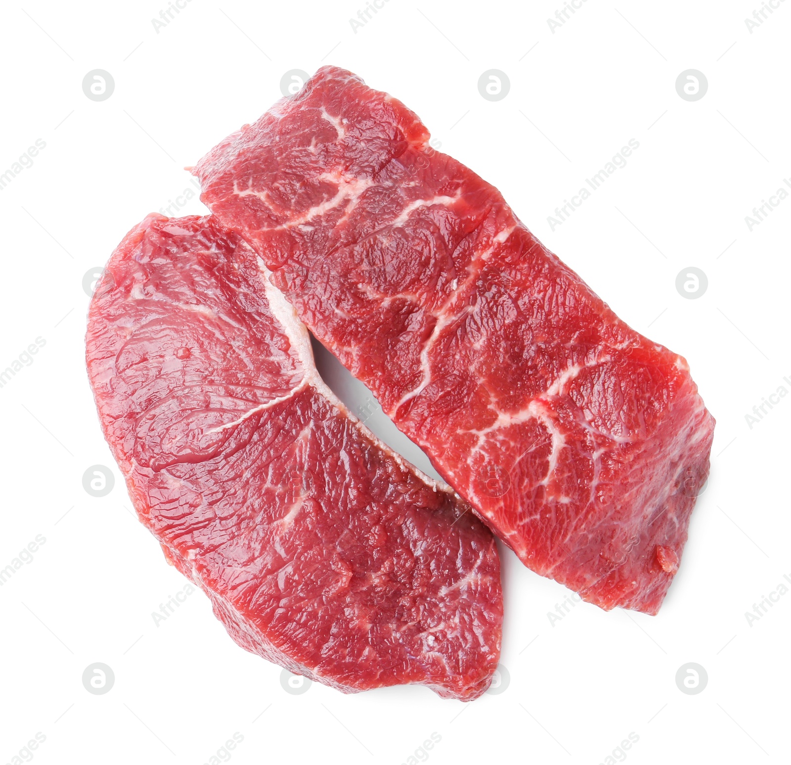 Photo of Pieces of raw beef meat isolated on white, top view