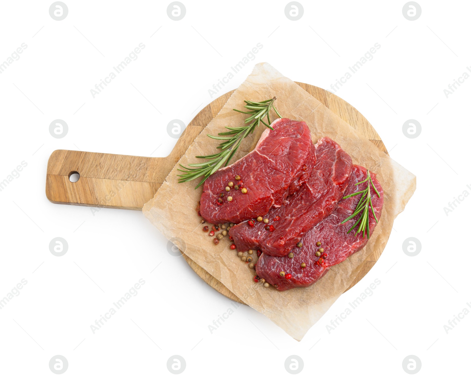 Photo of Pieces of raw beef meat, rosemary and peppercorns isolated on white, top view