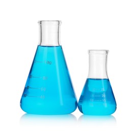 Photo of Flasks with blue liquid isolated on white