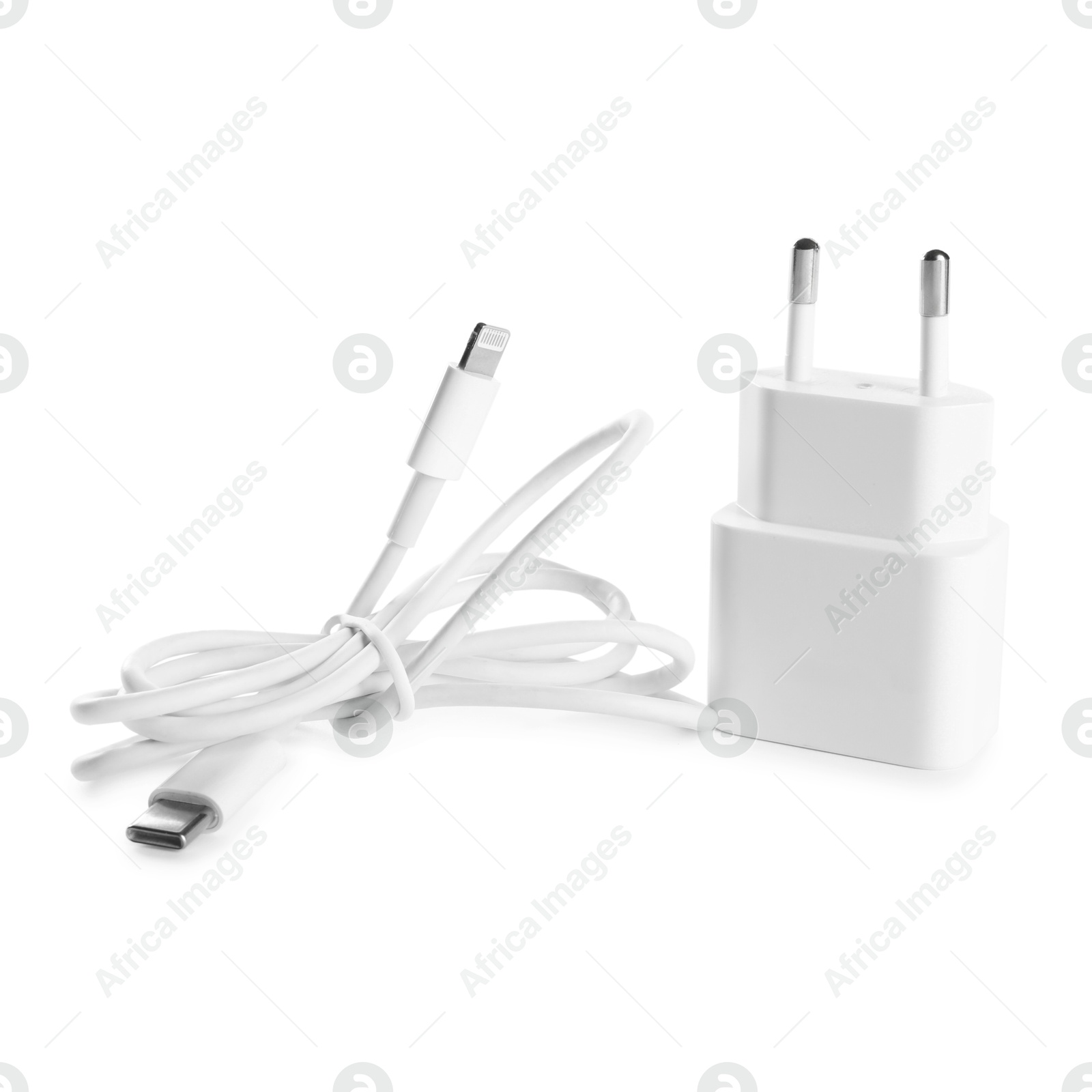 Photo of USB power adapter and charge cable isolated on white