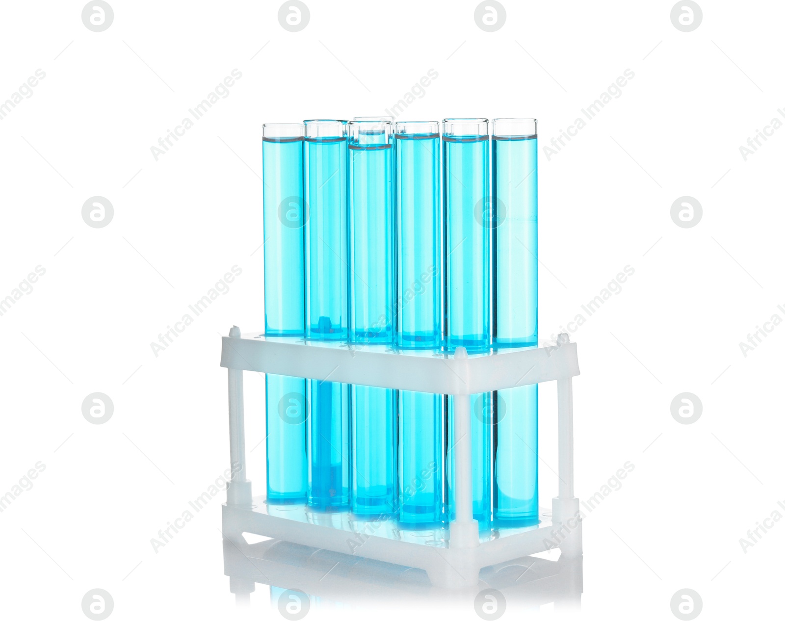 Photo of Test tubes with blue liquid isolated on white