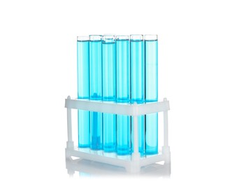 Photo of Test tubes with blue liquid isolated on white