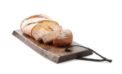 Photo of Wooden cutting board with fresh bread isolated on white