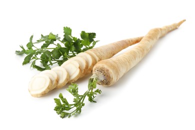 Photo of Fresh parsley and roots isolated on white