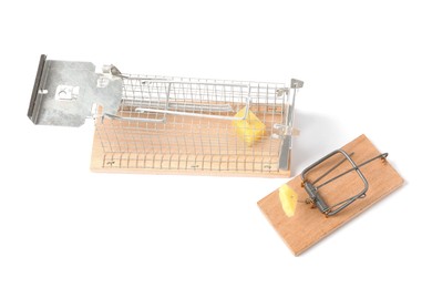 Photo of Two mouse traps with cheese isolated on white