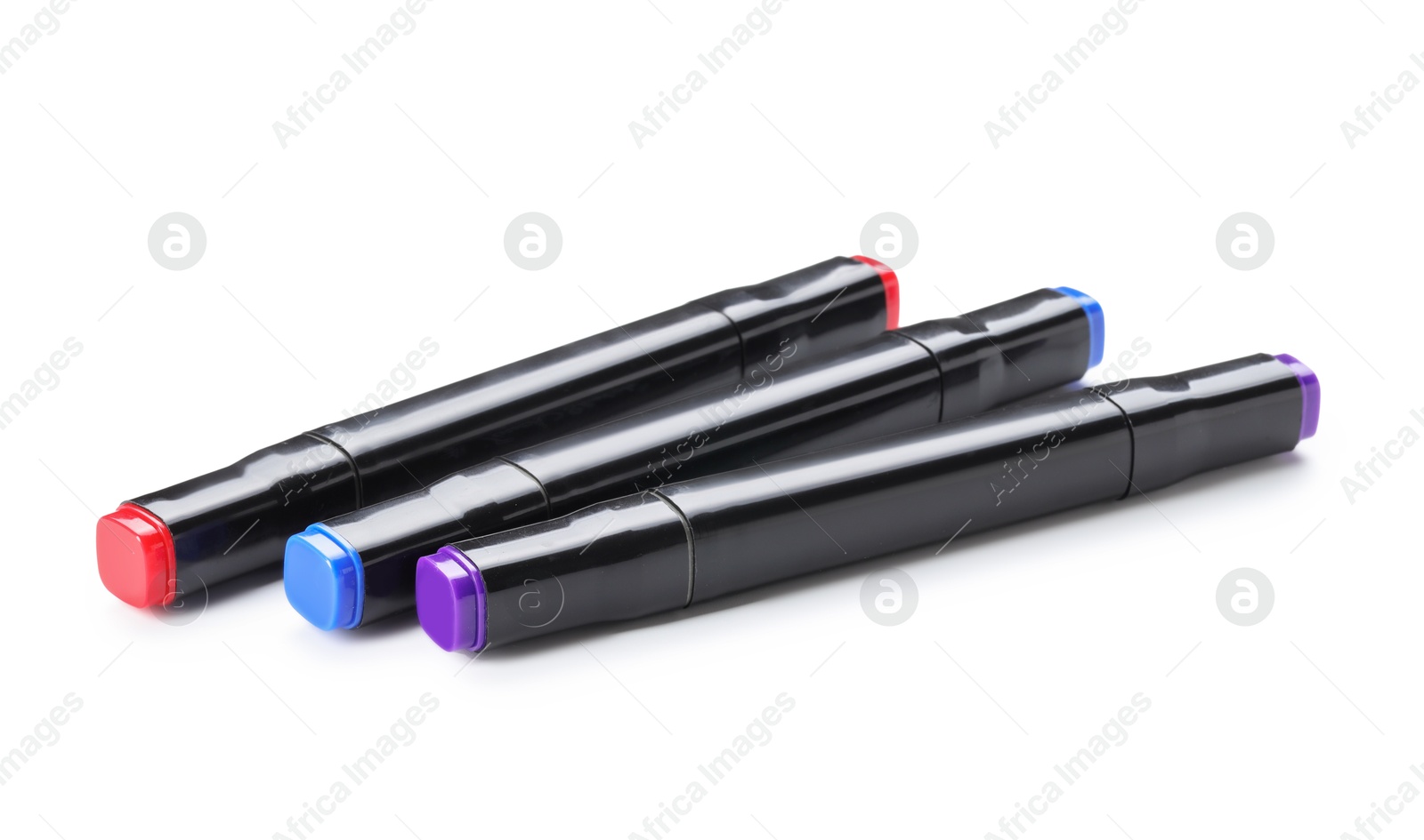 Photo of Three double sided markers isolated on white