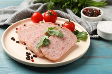 Pieces of tasty canned meat, parsley, peppercorns and tomatoes on light blue wooden table, closeup