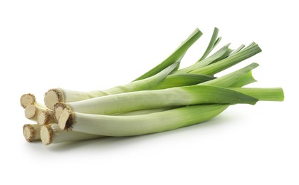 Photo of Fresh leeks isolated on white. Spicy vegetable