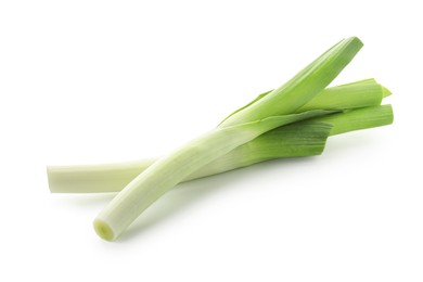 Photo of Fresh leeks isolated on white. Spicy vegetable