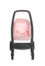 Photo of Pink doll stroller isolated on white. Kid's toy