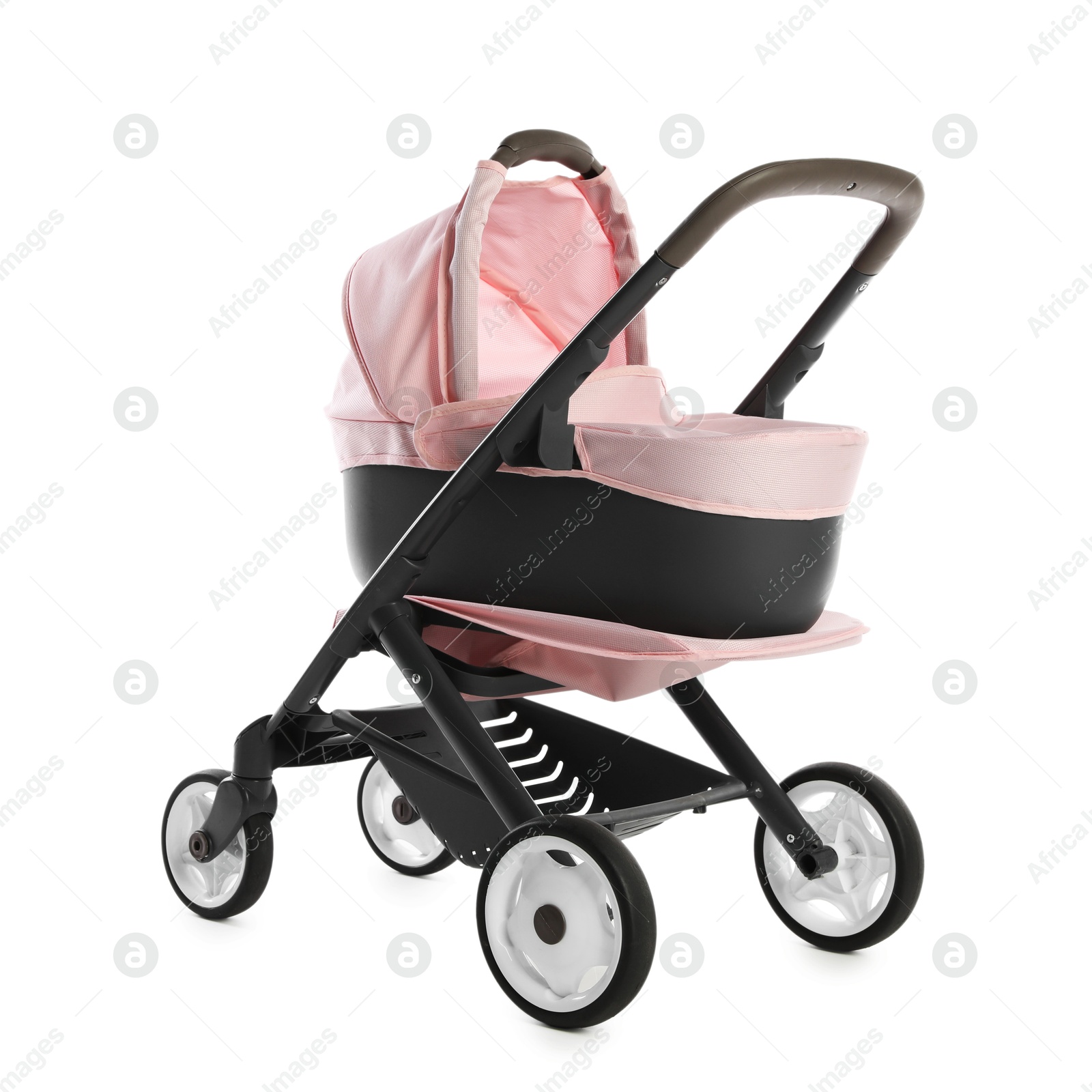 Photo of Pink doll stroller isolated on white. Kid's toy