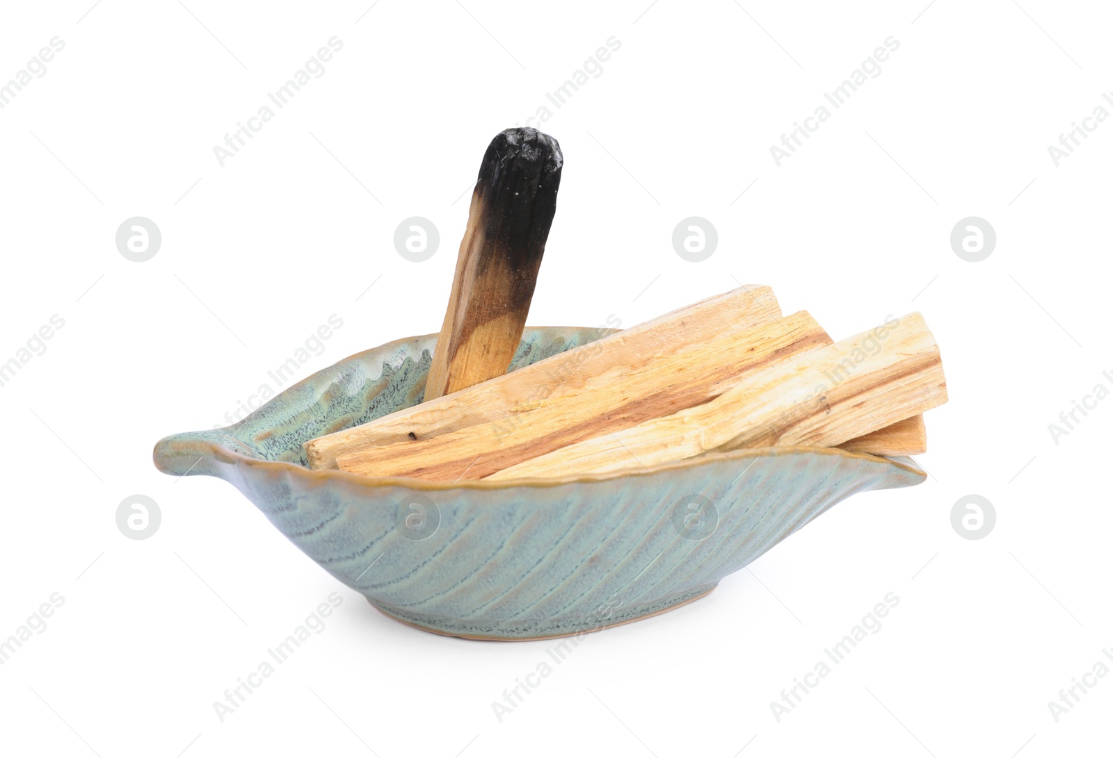 Photo of Palo santo sticks and burnt one on white background