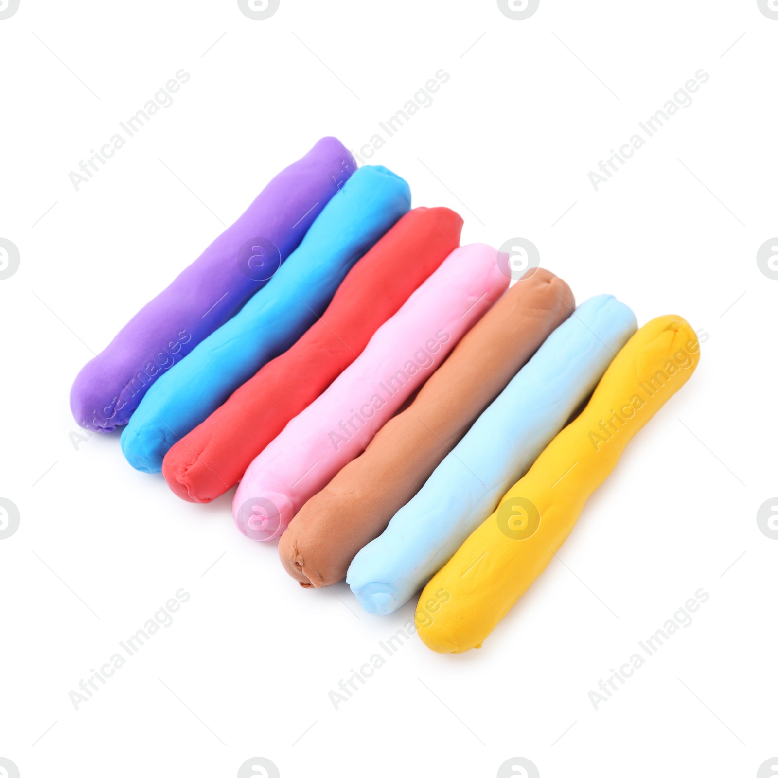 Photo of Different colorful play dough isolated on white