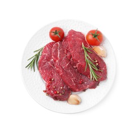 Photo of Pieces of raw beef meat, spices and tomatoes isolated on white, top view